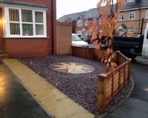 tarmac driveways in sheffield with front garden design with stone and a central feature